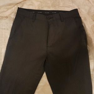 Men's Travis Mathew Pinstripes Grey Golf Pants with notched bottoms.